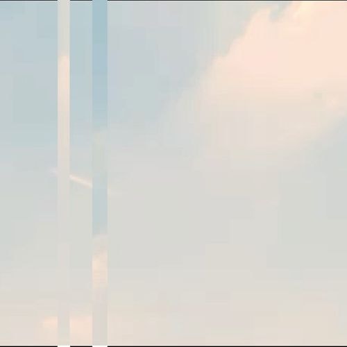 Light blue sky with white and peach-colored clouds, severely distorted by multiple vertical bands and digital interference.