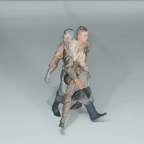 Een jonge man en een sculpturaal figuur in gelaagde kleding lopen een studio binnen met twee Nanlite softboxen.